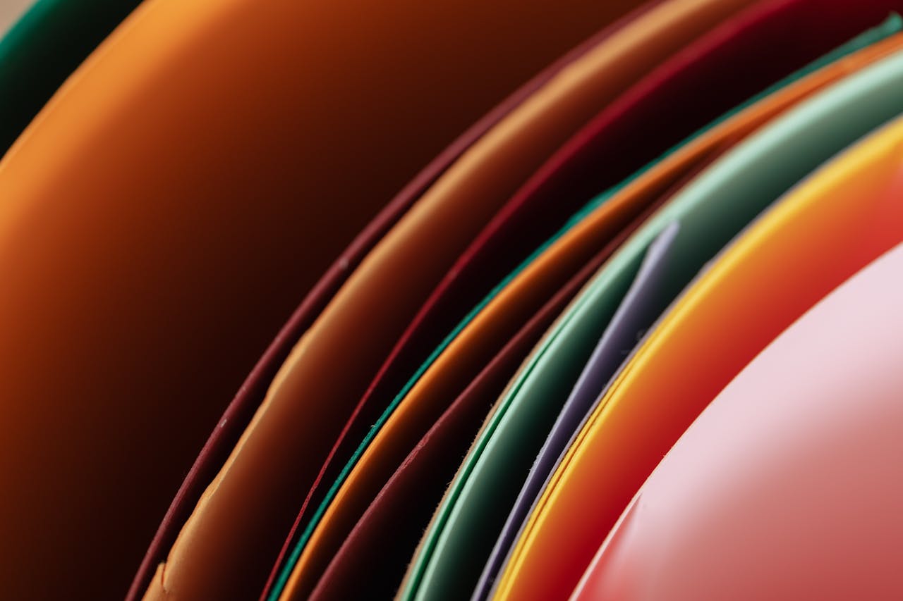Closeup abstract set of colored paper surrounded together in studio